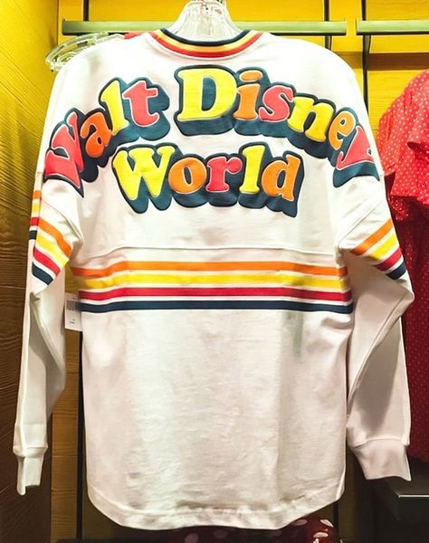 Disney World's Vintage Merch Line Is Like a '70s Rainbow Explosion, and We Want It All Dream Photos, Rainbow Explosion, 70s Rainbow, Retro Disney, Retro Sweatshirts, Disney Food Blog, Spirit Jersey, Smart Living, Disney Food