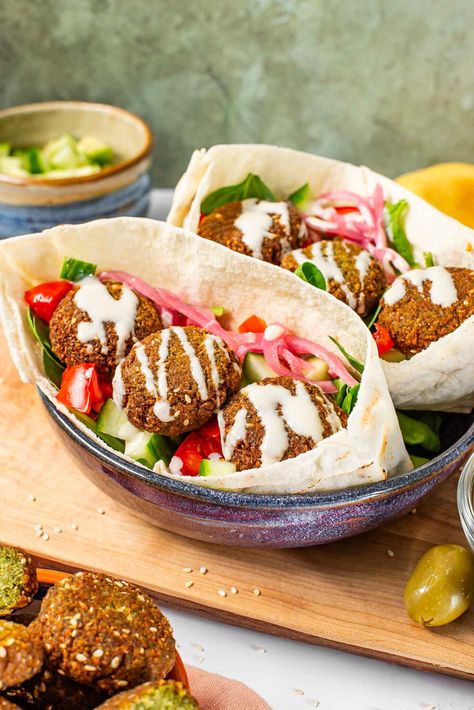 Falafel Pita With Falafel That Won't Fall Apart! • Tasty Thrifty Timely Chickpea Falafel, Pita Recipe, Falafel Pita, Cooked Chickpeas, Pita Wrap, Quick Pickled Red Onions, Pita Recipes, Lemon Tahini Dressing, Falafel Recipe