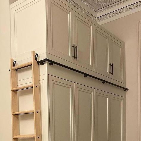 LLCompany | UK on Instagram: "🌟 Explore the innovative design of this sleek built-in wardrobe by @tempus4_ltd 🚪 This bespoke creation includes a custom-built ladder, maximizing every inch of available space. Our hook-on hardware from @libraryladderco elegantly stows the ladder upright, ensuring no compromise on room space. Discover how this design showcases the perfect harmony between functionality and style! . . . . #builtinwardrobe #customdesign #interiordesign #spacesavingsolution #innovativestorage #bespokefurniture #homeorganization #interiorladder" Tall Built In Wardrobe, High Wardrobe Design, Built In Wardrobe With Ladder, Built In With Ladder, Closet Ladder Ideas, Wardrobe With Ladder, Tall Closet Organization, Closet With Ladder, Built In Wardrobe Ideas Bedrooms