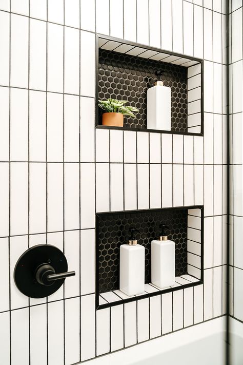 Bathroom Ideas Vertical Tile, Vertical Subway Tile Shower Wall, Honeycomb Bathroom Tile Showers, White Tile And Black Grout Bathroom, Black White Tiled Bathroom, Shower Niche Black And White, Subway Tile Bathroom With Niche, White Subway Tile Shower Niche Ideas, Vertical Subway Tile Bathroom Black Grout