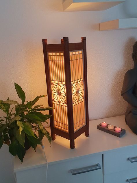 Japanese style Shoji lamp, handmade from walnut and linden. Four Kumiko panels with Asa-no-ha patterns are covered with shoji paper and can be easily removed. The frame has grooves at the top and bottom into which the four panels lock securely and are flush. The small and large details make this lamp an absolute eye-catcher - whether day or night. In total it was assembled from over 220 individual parts. It is equipped with an LED lamp with a soft and warm light. A long power cable is covered in Chinese Floor Lamp, Traditional Japanese Decor, Asian Room Aesthetic, Japanese Themed Room, Japanese Floor Lamp, Japanese Apartment Decor, Shoji Lamp, Soft Lamp, Shoji Paper