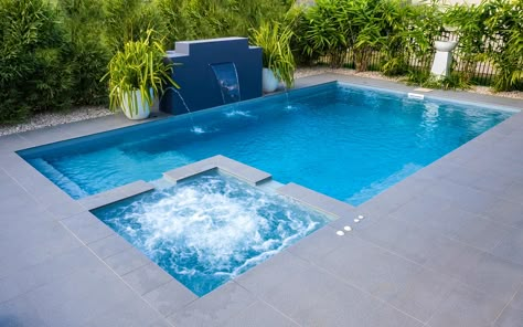 A fibreglass swimming pool offering built-in spa, relaxing splash deck and open swim area, this pool is The Absolute Waterfall Pool, Small Inground Pool, Pool Pavers, Dream Backyard Pool, Outside Pool, Leisure Pools, Pools Backyard Inground, Fiberglass Swimming Pools, Pool Landscape Design