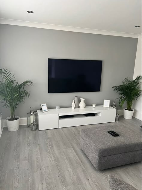 Grey And Dark Grey Living Room, Apartment Living Room Gray Floors, Modern Dark Grey Living Room, Modern Grey Living Room Ideas Wall, White Wall Grey Floor Living Room, Minimalist Grey And White Living Room, Tv Wall Paint Color Ideas, Grey Lounge Aesthetic, Grey Living Room Ideas Minimalist