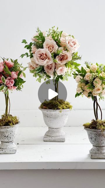 New Orleans Wedding & Event Florist on Instagram: "Our lovely friend Lauren (@lovegoodrentals) was hosting a southern italian themed seated dinner for friends and asked for help with florals.  And I love a good theme.   Et voila, garden rose floral topiary with accents of mixed greens and a fresh moss base.   @eufloriausa   #dinnerparty #italianstyle #topiary #floraltrees #nolaflorist #flowerreels  #flowers #roses #floralart #underthefloralspell #fleurs #gardenparty #italiantheme #gardenurns #flowerstagram #gardenroses #topiarygarden #flowersmakemehappy #weddinginspiration #weddingdecor #centerpieces #neworleanswedding #leafandpetalnola" Topiary Flower Arrangements, French Inspired Floral Arrangements, Iris Floral Arrangements, French Flower Arrangements Paris, Old World Floral Arrangements, Ethereal Floral Arrangements, Dinner For Friends, Floral Topiaries, Italian Theme