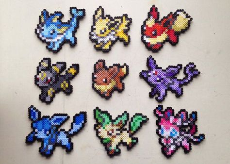 Evoli | Aquali | Voltali | Flareon | Umbreon | Espeon | Leafeon | Glaceon | Shiny Eevee, Umbreon Espeon, Hama Beads Pokemon, Image Pixel Art, Umbreon And Espeon, Pokemon Perler, Pokemon Bead, Pixels Art, Pokemon Sprites