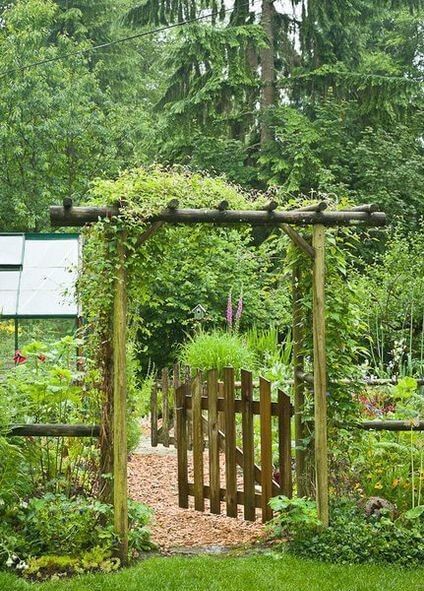 Use glow-in-the-dark pebbles to create a mystical pathway that lights up at night. Wooden Arbor With Gate, Arbor Over Gate, Garden Gate Arbor, Garden Arbor With Gate, Gated Garden, Wooden Garden Gate, Garden Archway, Garden Gates And Fencing, Wood Arbor