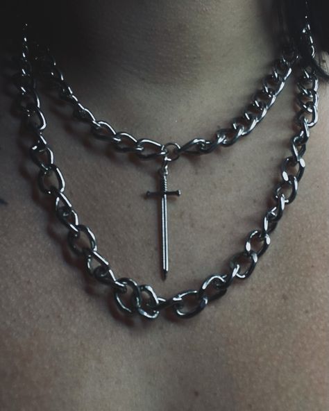 This stacked chain necklace is available now 🗡️ The choker has a length of 15” The longer chain has a length of 21” The necklace is adjustable; can extend up to two inches. #handmade #jewelry #alt #altgirl #gothgirl #summerdarkness #darksomecraftmkt #darksomevirtualmarket #virtualmarket #summervibes #altjewelry #gothjewery Chains Aesthetic, The Necklace, Alt Girl, Long Chain, Summer Vibes, Choker, Chain Necklace, Handmade Jewelry, Chain