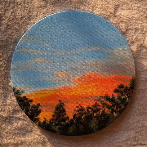 What is it about sunsets that you like? Acrylic on canvas✨ Available for SALE #art #acryliconcanvas #acrylicpainting #sunset #sky #clouds #sunsetpainting #artsandhya #aesthetic #explore Fall Sky Painting, Circular Art Ideas, Circle Canvas Painting Aesthetic, Circular Painting Ideas, Painting On Circle Canvas, Circle Canvas Painting Ideas, Sunset Clouds Painting, Acrylic Paintings Ideas, Sky Painting Acrylic