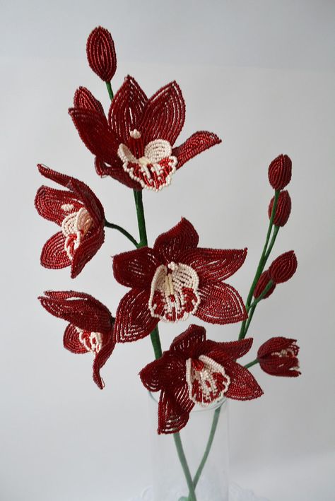 Beaded branch orchids Beaded Orchid Pattern, Beaded Flowers Patterns Tutorials, Rose Orchid Bouquet, Beaded Orchid, Burgundy Orchid, Flowers With Beads, Orchid Design, Bead Flowers, Beaded Flowers Patterns