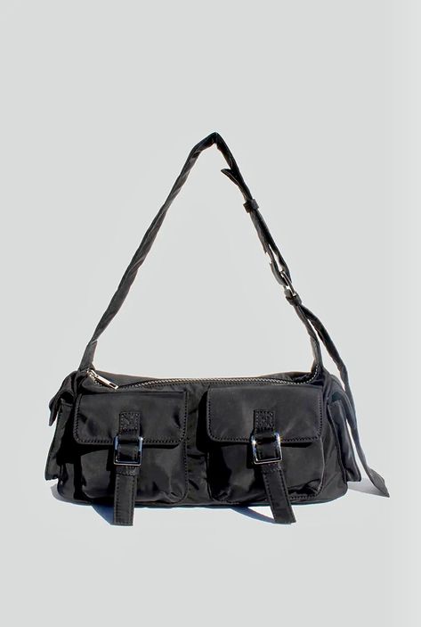 It’s giving 90s and we’re here for it! The exterior of this bag features double front pockets, adjustable shoulder strap and side pockets. Inside is single compartment with a wall pocket. Complete with silver hardware Street Level Handbags 100% Nylon Shoulder bag Zipper closure 12” x 3.3” x 4.8” 90s Bag, Nylon Shoulder Bag, Black Sand, Wall Pockets, Silver Hardware, Front Pocket, Shoulder Strap, Exterior, Shoulder Bag