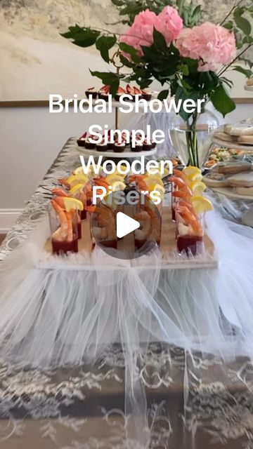 Jen Bercier on Instagram: "Building risers to feature food at events make the dishes feel special and it is so simple to do!
I used left over oak plywood cut into various sizes.
Using everyday household items like boxes, canned goods, etc for the risers makes cleanup  a snap and storing the risers simple… 

#diy #diyhomedecor  #bridalshower" Diy Food Risers, Table Risers Diy Ideas, Food Displays For Parties Buffet Tables, Buffet Risers, Table Risers, Diy Buffet, Wooden Box Diy, Oak Plywood, Canned Goods