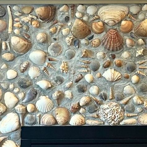 Brian Fairfield on Instagram: "“Sailor’s valentine” fireplace surround for @dunesonthewaterfrontmaine.  This was kinda tough for me,  because while @kristadstokes and @mark.d.cotto gave me pretty clear instructions(they wanted it to look like a crafty drunk mermaid built it and the ocean washed over it for years, or something like that), I was never confident that I could quite make it work.  When it was all said and done though,  all parties involved seemed to like it, and I’m gonna call that a win!  Thanks again @timjharrington and crew for trusting me with another one of your projects.  It’s always a fun challenge.  . . . . #thatstoneguy #mainestonework #sailorsvalentine #fireplace #beachy #seashells  Ps.  Huge thanks to @oftheseastudio for the shells used for this.  She also took the p Shell Fireplace Surround, Seashell Fireplace, Shell Mantle, Shell Fireplace, Coastal Fireplace, Sailors Valentine, Shell Mosaic, Fire Pit Designs, Fireplace Surround