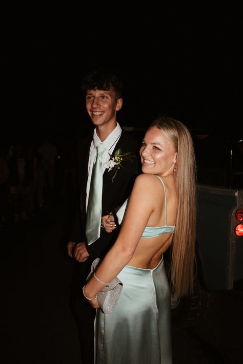 light blue satin dress / couple / suit / light blue tie / long hair / blonde girl / brunette boy / matric dance walk in / prom / boyfriend / girlfriend Matric Dance Pictures, Light Green Prom Couple, Light Blue Prom Dress Aesthetic, Light Blue Prom Dress Couple, Light Blue Prom Couple, Prom Dress Blonde Hair, Green Prom Couple, Prom Boyfriend, Blue Prom Couple