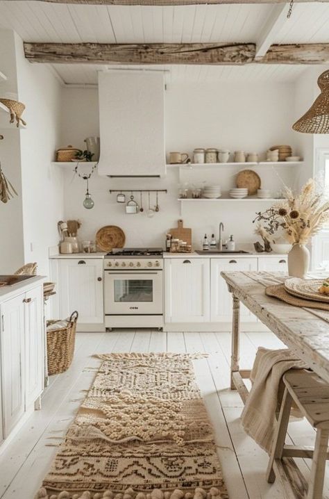 Have you ever wondered how the warmth of bohemian style can blend with the clean lines of Scandinavian design to transform your kitchen into an inviting yet functional heart of the home? The fusion of Scandi and Boho elements brings together the best of both worlds—efficiency, and charm—into a cooking space that’s as inspiring as it is practical. In this article, we explore 29 Scandi Boho kitchen inspirations that are not only aesthetically pleas Scandi Boho Kitchen, Serene Kitchen, Kitchen Backdrop, Hygge Kitchen, Scandinavian Farmhouse Style, Beautiful Kitchenware, Boho Kitchen Ideas, Scandinavian Farmhouse, Scandinavian Kitchen Design