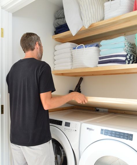 Some Quick & Extremely Functional Laundry Closet Shelves | Young House Love Build Shelves In Laundry Room, Laundry Room Closet Shelves, Laundry Closet With Wallpaper, Small Laundry Closets, Laundry Nook Hallways, Laundry Storage Shelves, Pantry Laundry Room Combo Small Spaces Open Shelves, Laundry Closet Front Loaders, Peg Board Laundry Room Organization