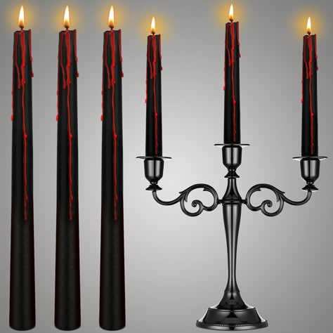 PRICES MAY VARY. Candles that Bleed When Lit: this vampire tears black candles set includes a 3-head black taper candle holder and 6 pcs black taper candles, when lit, these candles look like they are bleeding, help you to create a scare atmosphere, a nice choice for Halloween decoration Create a Strong Halloween Atmosphere: if you decide to surprise your friends with extraordinary Halloween characters, bleeding taper candle that bleeds will also match your outfit; You can also design a special Halloween Party Decor Indoor, 1920s Halloween Decor, Vampire Ball Decorations, Dracula Halloween Decor, Medical Halloween Decorations, Vampire Halloween Decor, Red Halloween Decor, Vampire Halloween Decorations, Gothic Tablescape