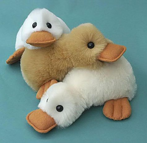 Fluffy Duck Pattern - PDF | Craftsy - Adorable!!! Fluffy Duck, Raggy Dolls, Duck Pattern, Animal Sewing Patterns, Sewing Stuffed Animals, Plushie Patterns, Fabric Toys, Doll Sewing Patterns, Sock Animals