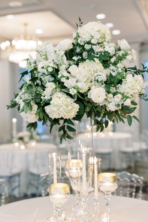 White flowers and lush greenery are a match made in heaven! 🌿 Doris Ione’s wedding centerpieces combine these elements to create an effortlessly chic and romantic look for your reception tables. Wedding Centerpieces White Flowers, White Flower Wedding Centerpieces, White And Green Centerpieces, Greenery White Wedding, Wedding Florals White, White And Greenery Wedding, Green Wedding Centerpieces, White Wedding Florals, Floral Table Decor