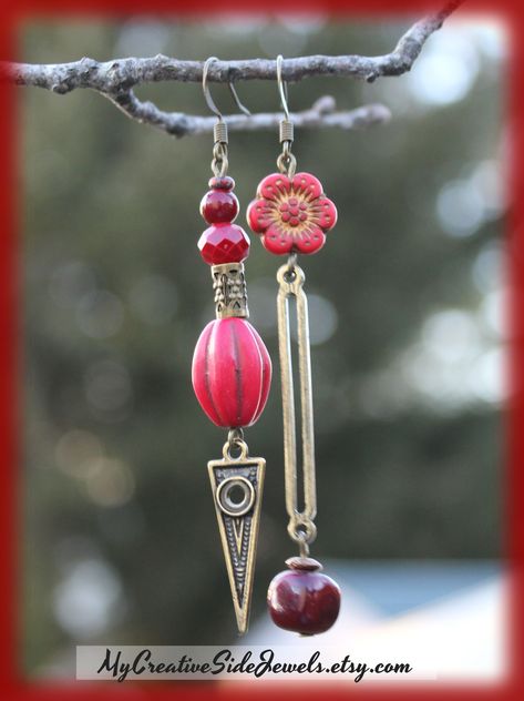 Boho chic red asymmetrical earrings. Handmade on Etsy: MyCreativeSideJewels.etsy.com #earrings #redearrings #asymmetricalearrings #flowerearrings #bohoearrings #bohojewelry #uniquejewelry #bohofashion #summerjewelry #giftforher #mismatchedearrings Mismatched Earrings Ideas, Asymmetrical Jewelry, Jewelry 2024, Asymmetric Earrings, Trend Ideas, Earrings Art Deco, Asymmetrical Earrings, Earrings Ideas, Seeing Red