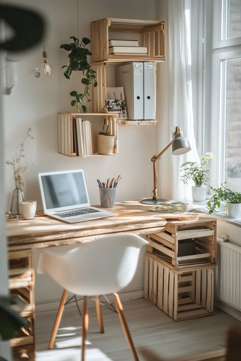 bureau à domicile, style scandinave, lumineux, bois clair, étagères en caisses de bois, chaise moderne blanche, pieds de chaise en bois, caisses empilées, lampe de bureau articulée, lampe suspendue, plantes vertes, fenêtre, lumière naturelle, minimaliste, rangement créatif, sol en bois, blanc, neutre, ordinateur portable, accessoires de bureau, bois recyclé, tendance éco-responsable, design fonctionnel, espace optimisé, confort visuel, ambiance chaleureuse, décoration végétale, épuré, ordonné, espace de travail inspirant, vase, pot en tissu. Deco Bureau Aesthetic, Vase Pot, Kitchens Bathrooms, Tiny House, Home Office, Loft, Dream House, Room Decor, Desk