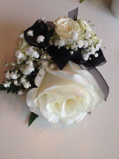 White Corsage Black Ribbon, White Flower Black Ribbon Corsage, Black Corsage And Boutonniere Prom, Black Corsages For Prom, Corsage Prom For Black Dress, Black Prom Dress Corsage, Black And White Prom Corsage, Black And White Corsage And Boutonniere, White And Black Boutonniere