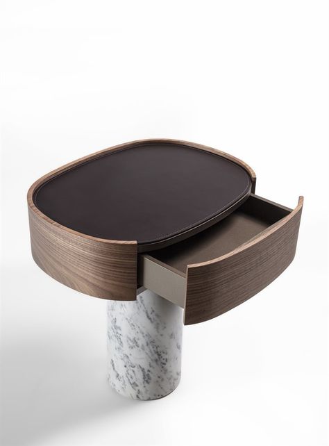 Ekero Night by Night table with cylindrical base in white Carrara or grey Carnic marble, central metal stem in a grey pewter finish, and wooden top drawer. Top in wood or covered by Cuoietto leather in the colors of the collection. Drawer interior in scratch-resistant Titanio finish.

#thedesigngalleryea #poradanighttable #poradafurniture #ekeronight #luxuryliving #bespokeliving #madeinitaly #availableinkenya Bespoke Furniture Interior Design, Contemporary Art Forms, Luxury Bedside Table, Night Tables, Bedside Table Design, Прикроватные Тумбочки, Wood Bedside Table, Side Tables Bedroom, C Table