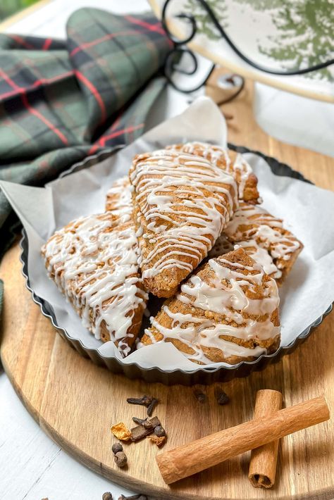 Gingerbread Scones bring instant holiday coziness to your home with these flavorful, delicious scones—tender with cream and molasses and warmly spiced with the season's best flavors. Pour yourself a warm cup of tea, and enjoy this Christmas treat! Fall Scones, Winter Afternoon Tea, Simple Vanilla Icing, Gingerbread Scones, Cinnamon Scones Recipe, Easy Gingerbread, Scone Recipes, How To Make Gingerbread, Homemade Scones