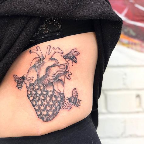 @channelle5 on Instagram: “HEART. 🐝🐝🐝 #tattoo #bee #honey #honeycomb #family #black #fineline #ribtattoo” Tattoo Bee, Honey Tattoo, Cathedral Tattoo, Sacred Heart Tattoo, Honeycomb Tattoo, Hearts Tattoo, Becoming A Tattoo Artist, Throat Tattoo, Temple Decor