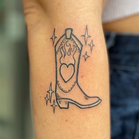 Kayla Gohm Webster on Instagram: “New boot goofin’ ✨ If a client wants a tattoo of a cowboy boot with a flaming heart, we give ‘em a tattoo of a cowboy boot with a flaming…” Cowboy Boot Matching Tattoos, Heart Cowboy Boot Tattoo, Boots Tattoo, New Boot Goofin, Hair Stylist Outfit, Boot Tattoo, Cowboy Boot Tattoo, Western Tattoo, Cowgirl Tattoos