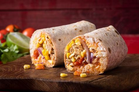 Mexican burrito with shredded chicken, cheddar cheese, seasoned corn, red onions, roasted tomato salsa, and chipotle aioli sauce. Served with white rice in a wheat wrap. Chipotle Aioli Sauce, Chicken Cheddar, Seasoned Corn, Roasted Tomato Salsa, Aioli Sauce, Chipotle Aioli, Different Types Of Food, Roasted Tomato, Red Onions