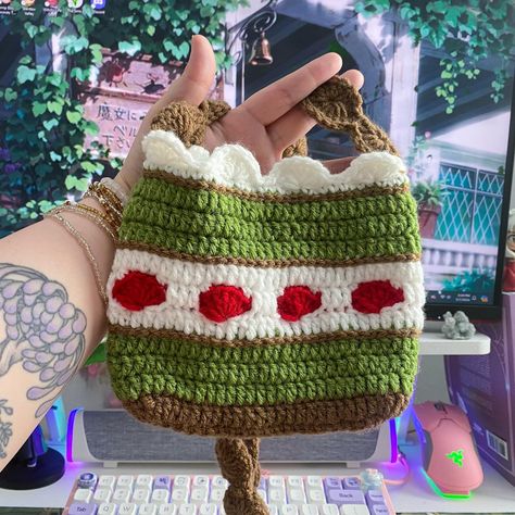 Matcha cake, anyone? ૮ ˶ᵔ ᵕ ᵔ˶ 𐙚 ა Isn’t this so cute?? I love the idea! I’ve got a couple more cakes in the making, but absolutely adore this pattern. 🫶🏻 Pattern by: @thecraftycrayfishco 🍵🍰 The *only* change I made (besides color) was making the strap longer so that it’s a crossbody now instead of a clutch 🥰🫶🏻 ‧₊˚🌱✩ ₊˚🍄⊹♡ Crochet , kawaii accessories, cottagecore decor , desk decor Partners: @kawaiiambergames @ruvithegremlin @wistaria.blooms @ghiblicottage @ashlynfromashland_acnh ... Matcha Cake, Cozy Day, Kawaii Crochet, Decor Desk, Cottagecore Decor, Cottage Core Aesthetic, Kawaii Accessories, Crochet Accessories, Change Me