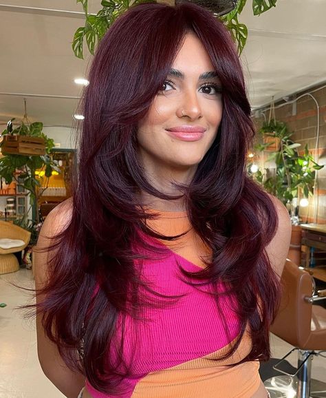 Long Burgundy Hair with Bouncy Layers Long Burgundy Hair, Dark Maroon Hair, Burgundy Hair Colors, Hair Color For Warm Skin Tones, Burgundy Hair With Highlights, Deep Burgundy Hair, Burgundy Butterfly, Red Burgundy Hair Color, Deep Red Hair Color