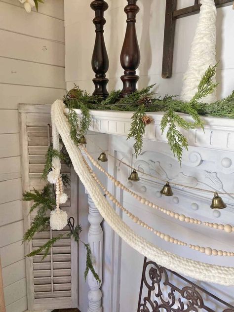 Decorating Ideas For Mantle, Diy Christmas Mantle Decor, Simple Christmas Mantle, Garland On Mantle, Mantle Decorating Ideas, Yarn Garland, Mantle Decorating, Bell Garland, Christmas Bead Garland