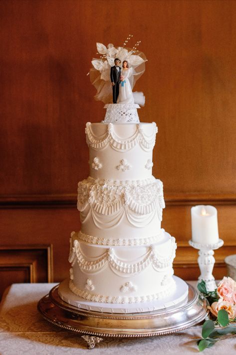 A three-tiered wedding cake with delicate lace design including a vintage cake topper of a bride and groom. | Photo by Sarah Block Photography Three Layer Cake Wedding, Vintage Wedding Cake With Topper, Traditional Wedding Cake Topper, Wedding Cake Designs Vintage, Retro Wedding Cakes Vintage, Vintage Cake Toppers Wedding, Wedding Cake Retro, Old School Wedding Cakes, Romantic Wedding Cake Vintage