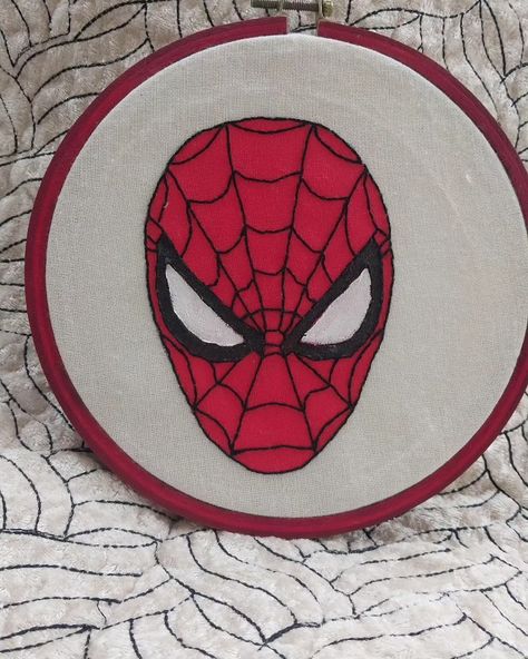 Beautiful hand embroidered hoop with fabric painting to enhance it Spiderman Embroidery, Spiderman Hand, Embroidered Hoop, Hand Embroidery Design, App Icon Design, Fabric Painting, Beautiful Hand, App Icon, Birthday Decorations