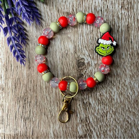 Handcrafted Artisan Brand New Feeling A Little Grinchy During The Holiday Season? For Carrying Your Keys On Your Wrist Makes A Great Keychain For Keys & Purse Makes A Thoughtful Gift Want To Customize Your Own? Customization Options Fully Custom Orders Are $1 Extra Per Pen/ $1 Extra Per Bookmark/ $2 Extra Per Keychain/$4 Per Wristlet See Photos For The Different Beads & Charms To Find All Of My Beaded Products In One Place, Click The Tag Below #Melissasxcloset ***Small Beads Can Cause A Choking Christmas Keychain, Pink Keychain, Keychain Craft, Blue Keychain, Purse Crafts, Mom Keychain, Bead Board, Artisan Bracelets, Christmas Bead