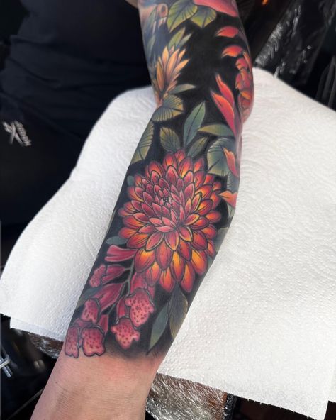 A tattoo sleeve of bright colour flowers with black background Traditional Floral Sleeve, Bright Flower Tattoos, Colorful Sleeve Tattoos, Black Flowers Tattoo, Black Sleeve Tattoo, J Tattoo, Forearm Flower Tattoo, Bright Tattoos, Tattoo Background