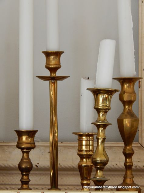 Brass Candlesticks On Mantle, Decorating With Brass Candlesticks, Brass Candlesticks Mantle, Brass Candlesticks Decor, Candlestick Display, Display Collections, Black Candlestick Holders, Candlestick Collection, Gold Candlestick Holders