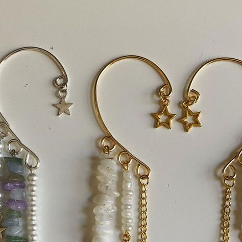 Beaded Planet on Instagram: "Recent custom order! I made them these super cute gold moonstone ear cuffs as well as remaking a side for ear cuffs they lost. #handmade #handmadejewelry #beadedjewelry #crystaljewelry #wirejewelry #earcuffs #earwrap #earrings #customorder #aesthetic #smallbusiness #jewelrybusiness #beadedplanet" Ear Cuffs Aesthetic, Ear Cuffs, Jewelry Business, Bling Bling, Wire Jewelry, Crystal Jewelry, Custom Orders, Moonstone, Ear Cuff