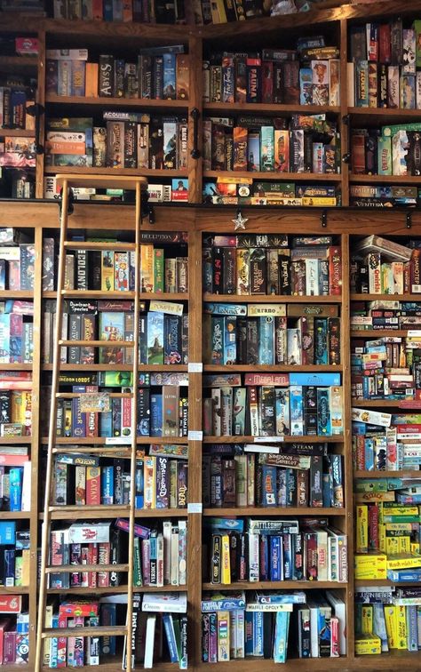 Board Game shelves Board Game Library Room, Board Game Room Decor Ideas, Board Game Living Room Ideas, Bookshelves Board Games, Aesthetic Board Game Storage, Game Shop Aesthetic, Board Game Library, Board Games Shelf, Board Game Shop