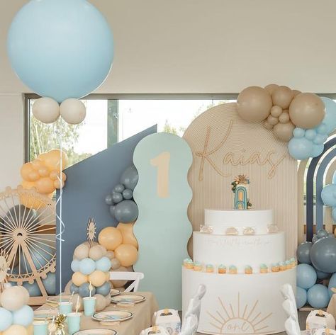 Crystal Wilson | Perth Event Stylist - Not your average party on Instagram: "Kaias’s first lap around the sun, #coachella inspired. ☀️🤍 Our elite package ✨ . . Venue - Piara waters pavilion  Styling and concept - @kidsco__  Cookies - @sugarmummacookies.co Favour boxes - @favourhouse__  Wooden cut outs - @barley.boy  Photographer - @jaydclicks  Soft play and castle - @thewhitecastleco  . #kidsco #kidsparties #kidspartiesperth #kidsbirthday #kidsbirthdayparty #kidspartyideas #kidspartyplanner #perthpartyhire #perthparties #perthkidsparties #perthkidsparty #perthkidspartyhire #perthpartystyling #pertheventstyling #backdrops #balloons #balloongarlands #perthballoons #cottoncandy #bubbles #partyideas #partytime #partyhire #smallbusinessaustralia  #holycommunion #firstbirthdayperth #celebration One Lap Around The Sun 1st Birthday, First Lap Around The Sun Birthday, Kids Party Hire, Kids Party Planner, Birthday Themes For Boys, 1st Birthday Themes, Kids' Party, Wedding Decor Elegant, Boy First Birthday