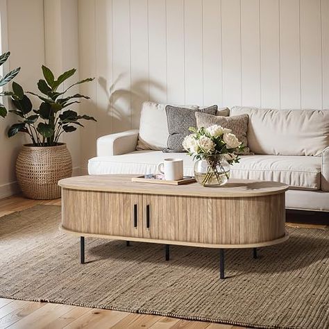 Storage coffee table family room Beige Couch Coffee Table, Wayfair Coffee Table, Small Coffee Tables For Small Spaces, Hoboken Apartment, Oval Wood Coffee Table, Tambour Doors, Circular Coffee Table, Living Room Center, Oval Coffee Table