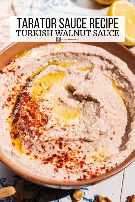 Tarator sauce is a humble Turkish mezze made of stale bread, garlic, lemon juice, walnuts, and olive oil. A deliciously creamy vegan dip, or sauce for fish, braised spinach, and beyond. Braised Spinach, Turkish Mezze, Avocado Hummus Recipe, Sauce For Fish, Bread Garlic, Easy Hummus Recipe, Walnut Sauce, Mediterranean Cooking, Grilled Seafood Recipes