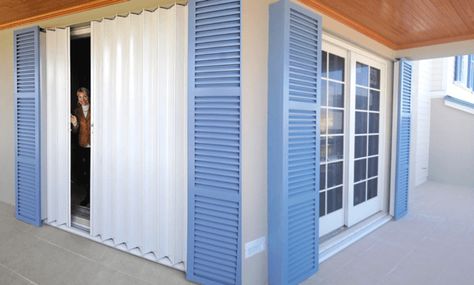 Pocket accordion shutters combine the look of beautiful colonial shutters with the ease and convenience of accordion shutters. Accordian Door, Shutters Inside, Colonial Shutters, Accordion Shutters, Security Shutters, House Shutters, Modern Ranch, Shutters Exterior, Florida Living