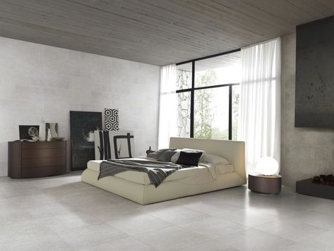 Eleganza Firenze Bianco. Firenze features light and dark shades of water stains on its surface reminiscent of industrial cement ﬂoors. This color body porcelain tile is available in 24"x24" with available trims in four colors: Grafite, Grigio, Cenere, Bianco along with an MTX Deco in Grafite and Cenere. Suitable for commercial and residential applications. Free Samples, just pay shipping at Tango Tile! Elegant Tiles, Concrete Look Tile, Best Floor Tiles, Wood Look Tile, Tile Projects, Grey Flooring, Contemporary Bedroom, Modern Bed, Bedroom Sets