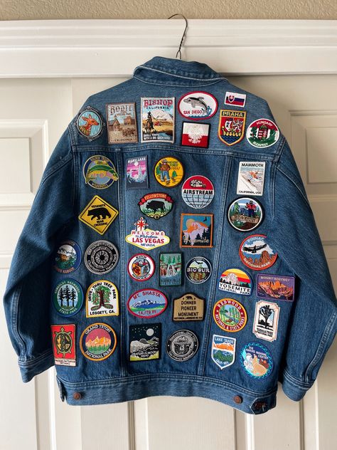 Travel Jacket Patches, Sweaters With Patches, Denim Jacket Craft Ideas, Iron On Patch Jean Jacket, Denim Jacket Patches Aesthetic, Denim Jacket Patches Inspiration, Patches Jean Jacket, Denim Jacket With Patches Diy, Diy Denim Jacket Patch