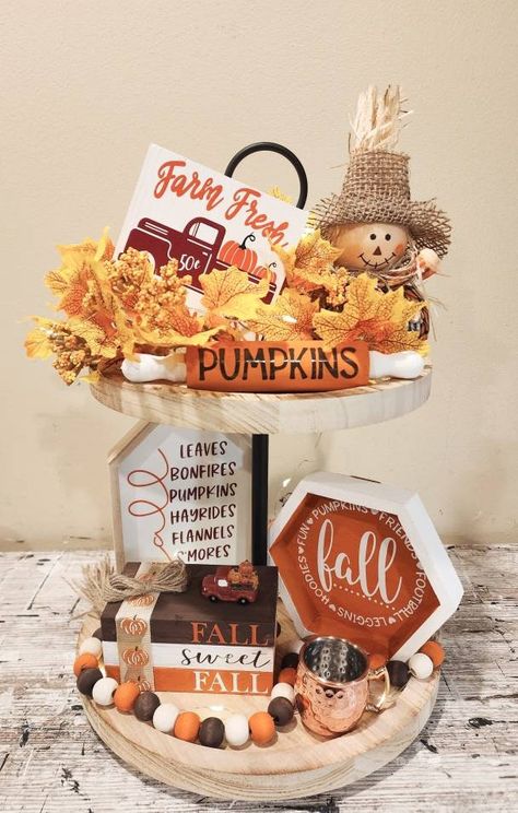 These Fall Tier tray decor pieces would be perfect to add to you Fall theme this year. Each piece is priced individually or you can buy all 6 pieces to get the whole look.  The pieces are as follows: Fall Book Stack Fall Bead Garland  Farm Fresh truck sign Fall bucket list sign Fall octagon sign Pumpkin rolling pin Tier tray NOT included Fall Two Tiered Tray Decor, Gold Painted Pumpkins, Fall Tier Tray Decor, Fall Tier Tray, Fall Tray Decor, Cute Fall Decor, Fall Porches, Tray Decor Ideas, Tiered Shelves