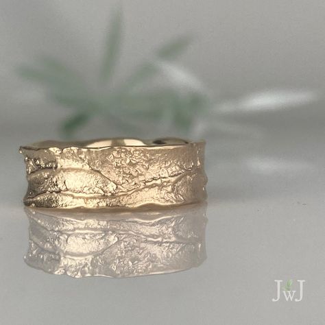 Finding inspiration in the simplicity, elegance, and grace of nature. Sand-textured wedding band with a subtle impression...a wildflower as it peeks through a blanketed meadow of powdery snow. Each band is uniquely created in our studio using the slow ancient technique of sand-casting. No 2 bands are exactly identical but each will have similar design details. Your band/s will be completed within 4 to 6 weeks. *This wedding band example is 8mm wide but could be customized to a width of your choi Trinity Engagement Ring, Tiffany Wedding Band, Boho Wedding Bands, Wave Wedding Band, Meadow Wedding, Textured Wedding Band, Branch Engagement Ring, Wide Wedding Bands, Wedding Sand