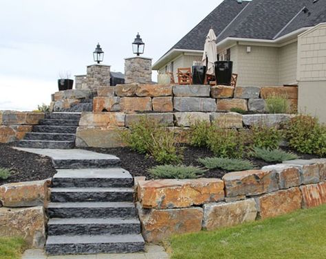 51 Really Cool Retaining Wall Ideas | Sebring Design Build | Design Trends Inexpensive Retaining Wall Ideas, Cheap Retaining Wall, Concrete Block Retaining Wall, Small Retaining Wall, Retaining Wall Ideas, Boulder Retaining Wall, Wood Retaining Wall, Rustic Landscaping, Concrete Retaining Walls