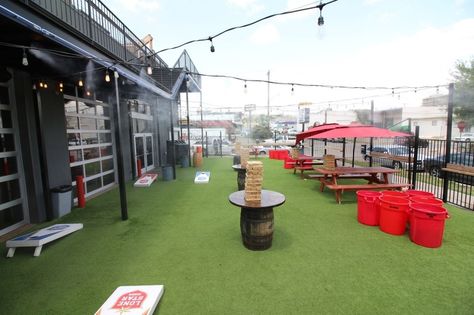 Our outdoor playground with numerous bar games. - Varsity Tavern - Fort Worth, TX Outdoor Bar And Grill, Patio Games, Outdoor Bar Area, Restaurant Game, Urban Bar, Diy Outdoor Bar, Office Photos, Outside Bars, Food Park